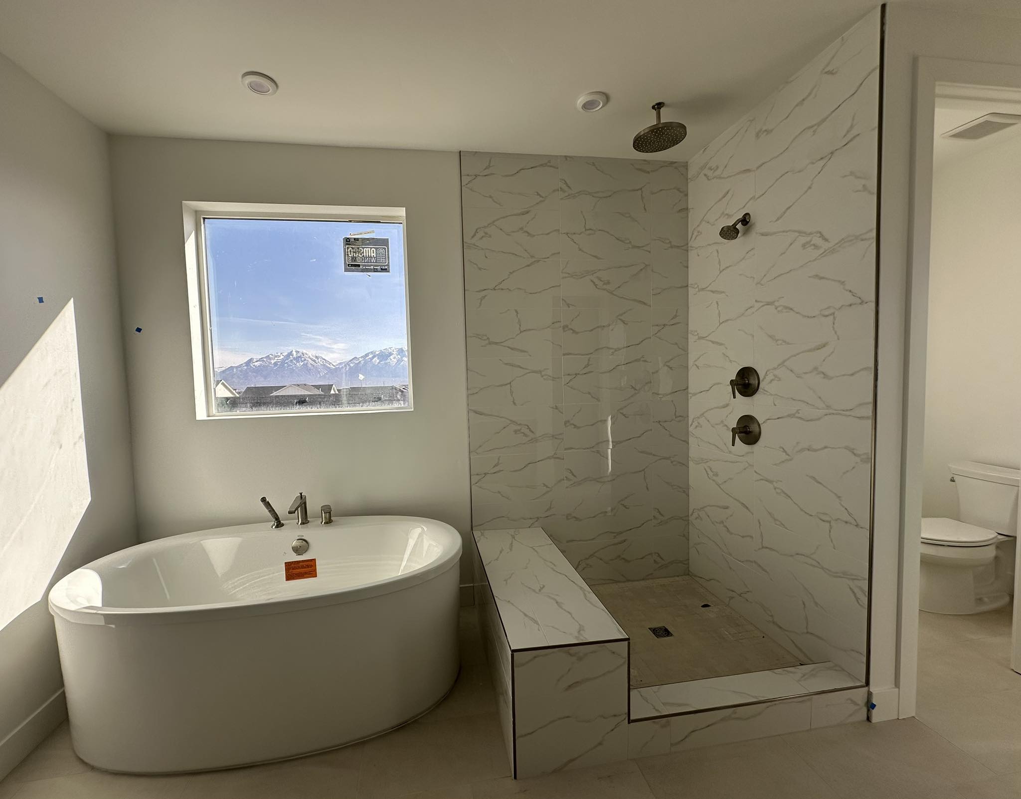 Bathroom 04 New bathroom tub and walk-in shower done by Latimer Plastering, LLC
