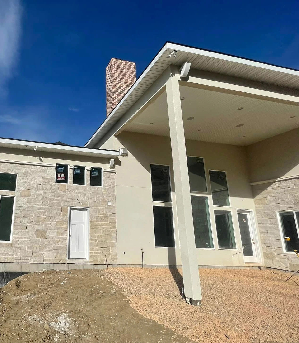 Fascia-&-Soffit-house-pic New Home by Latimer Plastering LLC with a view of the Soffit and Fascia