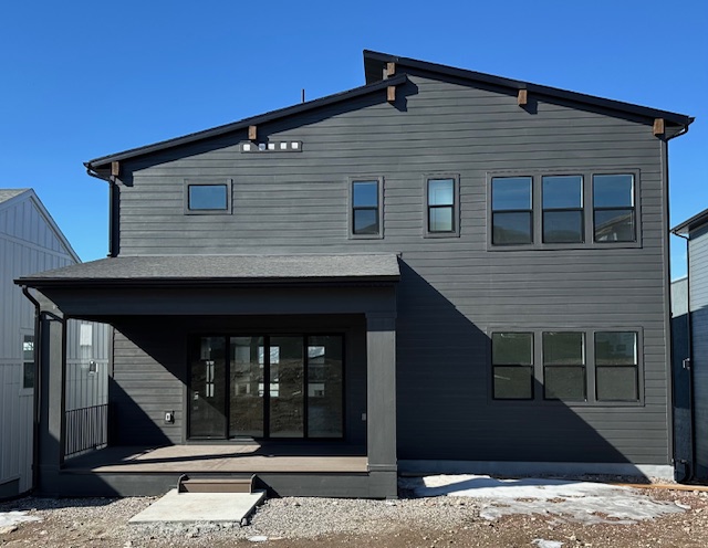 Home exterior 31 New home with a gutter system installed by Latimer Plastering LLC