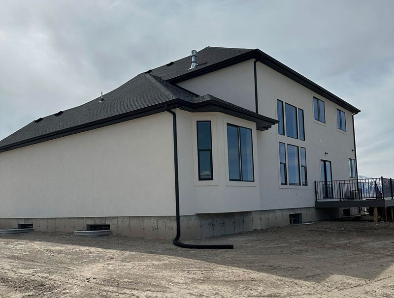 Home-with-stucco-2 New home with a light color stucco built by Latimer Plastering LLC
