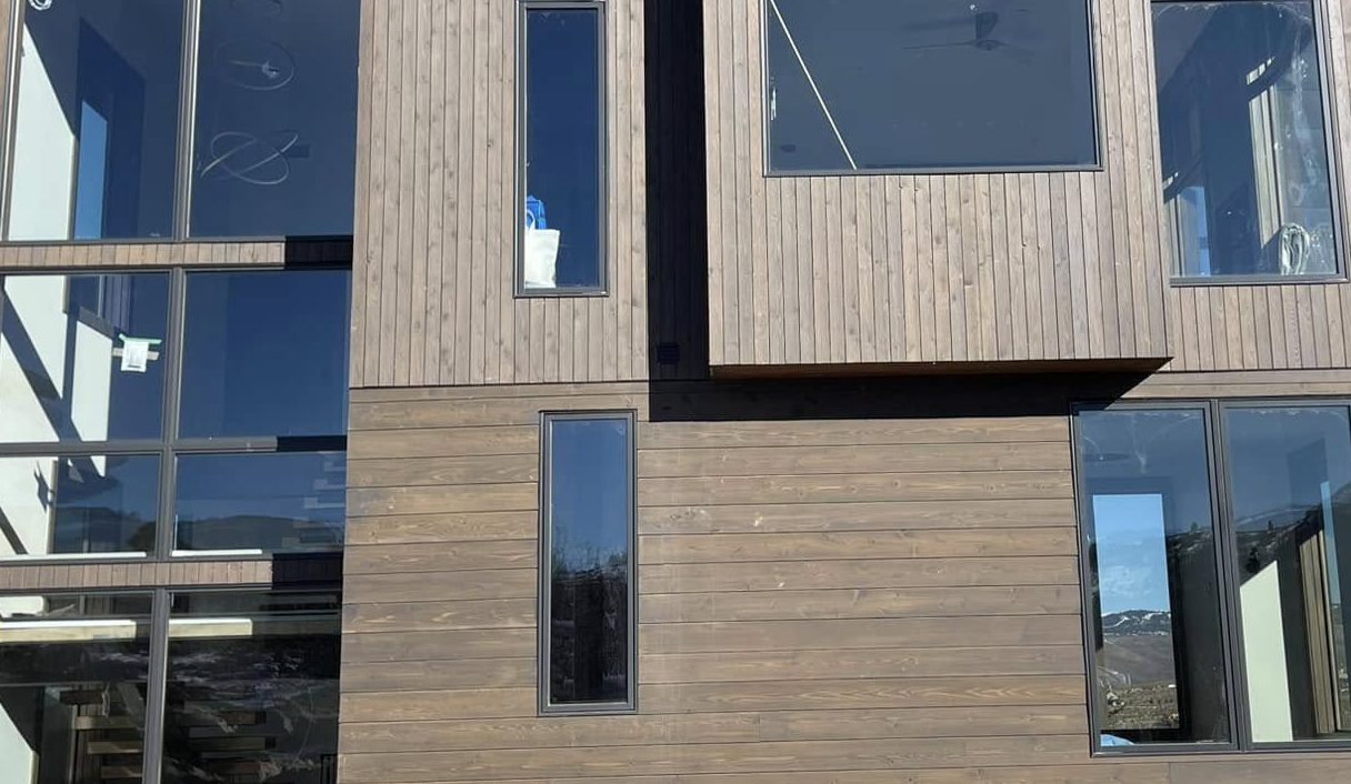 wood siding view of wood siding on a home installed by Latimer Plastering LLC