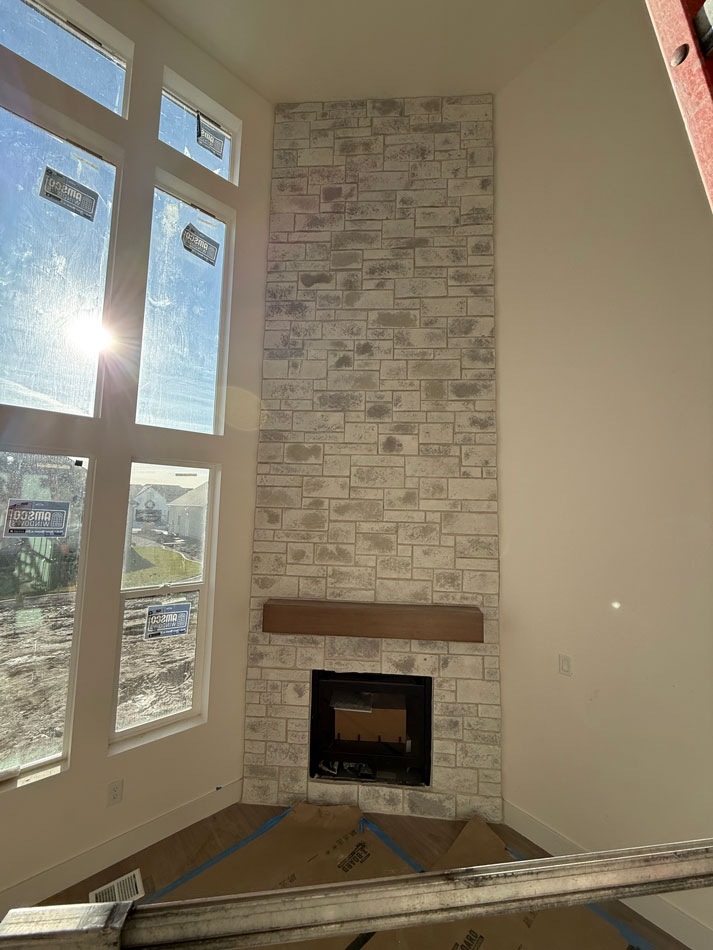 Interior-fireplace Interior fireplace with window next to it